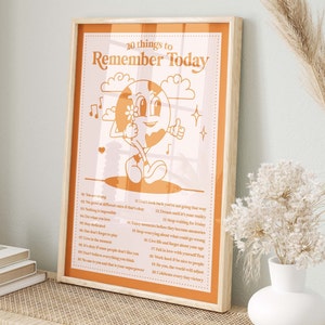 May include: A motivational poster with an orange background and a cartoon illustration of a globe holding a flower. The poster lists 20 things to remember today, including "You are strong", "It's okay to be different", and "Celebrate every victory".