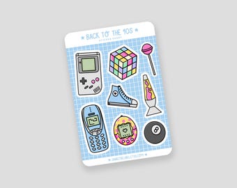 May include: A sticker sheet with a light blue grid pattern featuring colorful 90s-themed illustrations. Includes a Rubik's Cube, a Game Boy, a high-top sneaker, a lava lamp, a cell phone, a Tamagotchi, a lollipop, and an 8-ball. Text reads "BACK TO THE 90S".