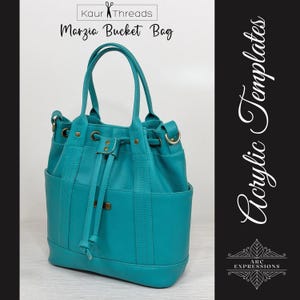 May include: A teal bucket bag with two top handles, a drawstring closure, and exterior side pockets. The bag features gold-toned hardware and a small rectangular brand tag. Text on the image reads Kaur Threads, Marzia Bucket Bag, and Acrylic Templates.