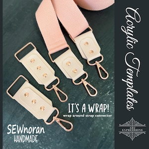 May include: Four cream-colored leather strap connectors with gold-colored metal clasps. The connectors are labeled "It's a Wrap!" and "wrap around strap connector". The image also shows a pink canvas strap.