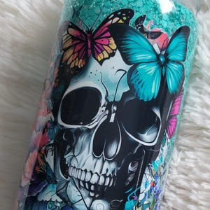 Skull, butterfly&#39;s and flowers 16oz Snowglobe tumbler.