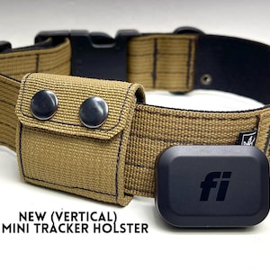 May include: Tan dog collar with a black buckle and a small pouch secured by two black snaps. A black Fi Mini Tracker and the text "NEW (VERTICAL) FI MINI TRACKER HOLSTER" are also visible.