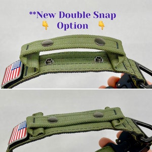 May include: A green nylon dog collar with a double snap closure and an American flag patch. The collar has a reinforced handle for easy control.