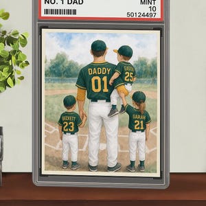 May include: A rectangular slab-style display case containing a print of a baseball-themed illustration. The label reads 2026 FAMILY LEAGUE NO. 1 DAD #1 MINT 10 50124497. The artwork depicts a person and three children in green and gold uniforms.