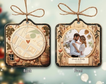 May include: A wooden ornament with a heart-shaped photo of a couple in front of a floral background. The text "Christ & Emily ENGAGED 30.11.2023" is printed on the ornament. The back of the ornament features a map with a red heart marking a location.