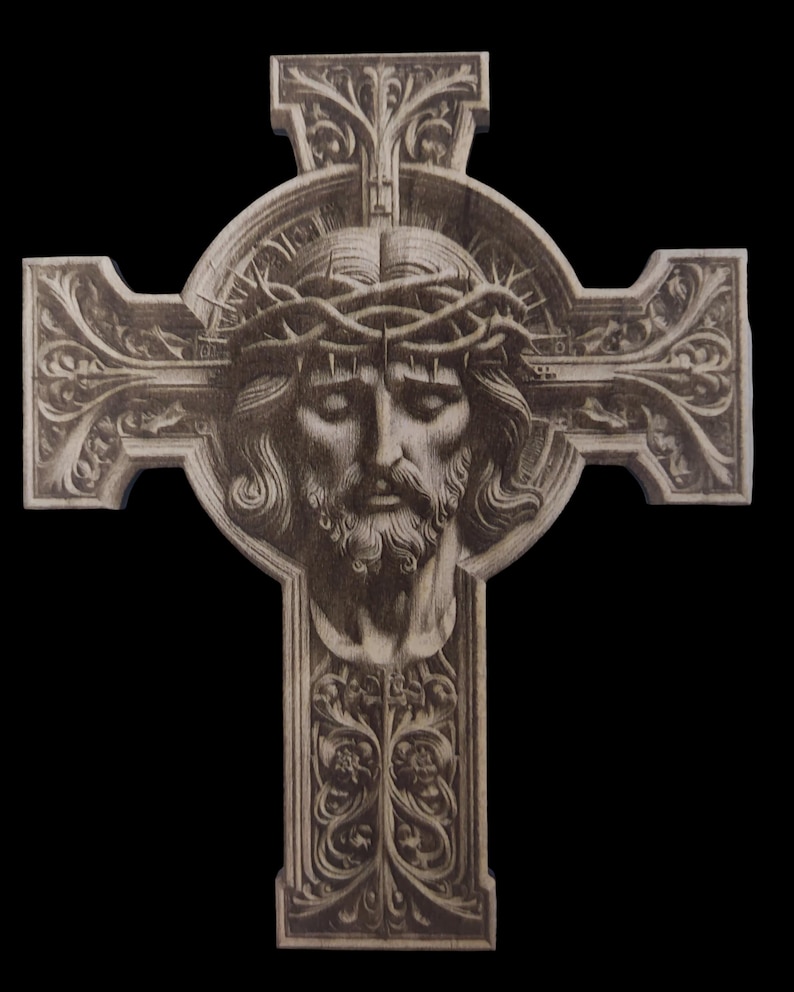 May include: A wooden cross with intricate carvings and a detailed image of Jesus Christ's face with a crown of thorns.