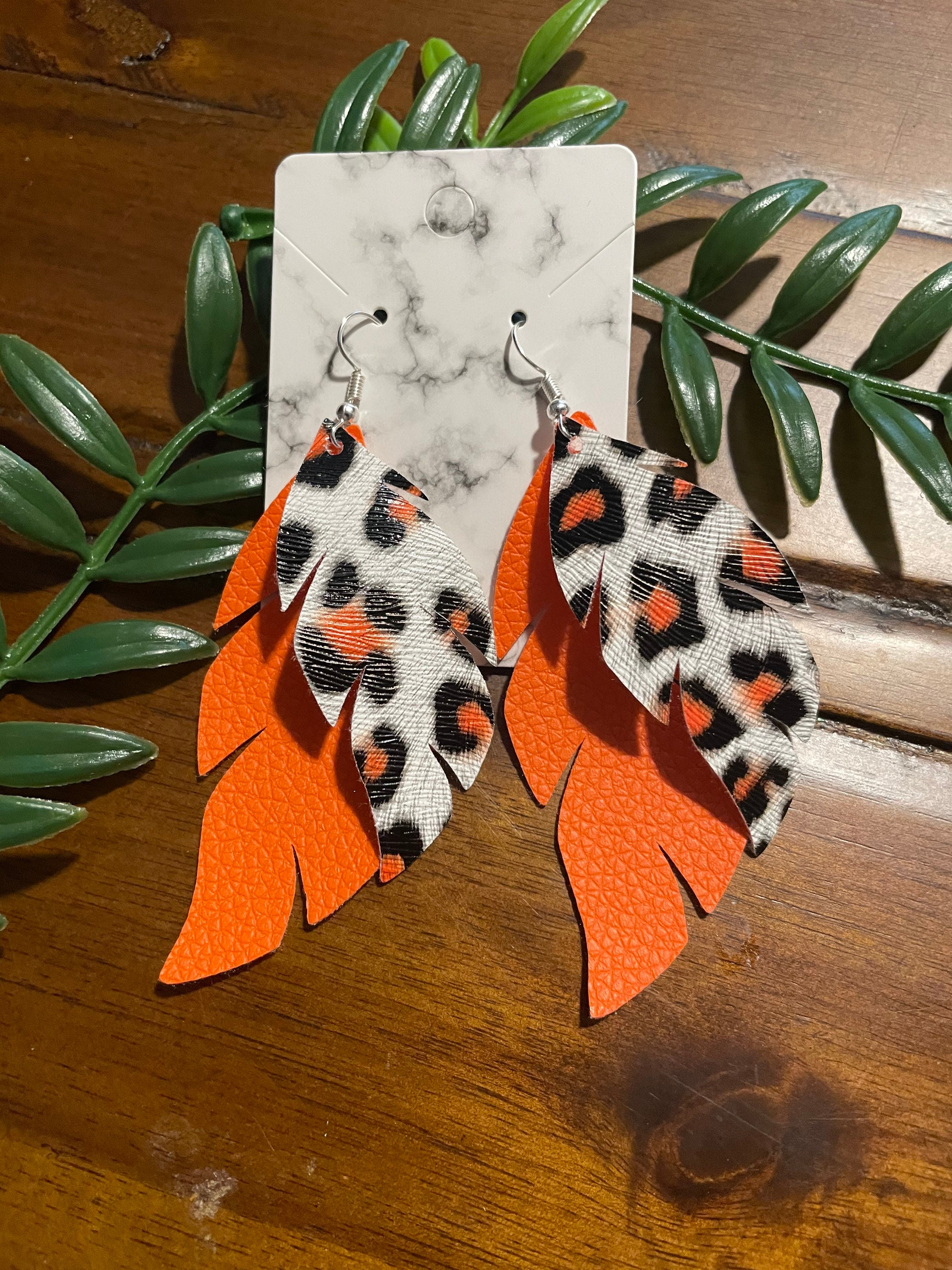 2 layer orange cheetah print faux leather earrings Etsy