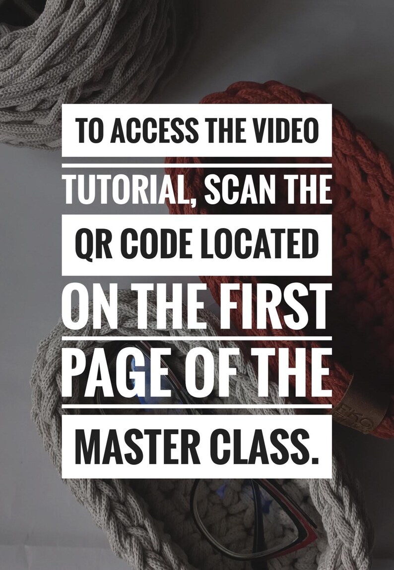 May include: Text on a white background with a gray and orange rope basket in the background. The text reads: "To access the video tutorial, scan the QR code located on the first page of the master class."