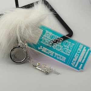 J-Hope “Hope On The Stage” Iridescent Acrylic Ticket Keychain featuring City and Date. Stunning Concert Memorabilia or Gift for Every ARMY