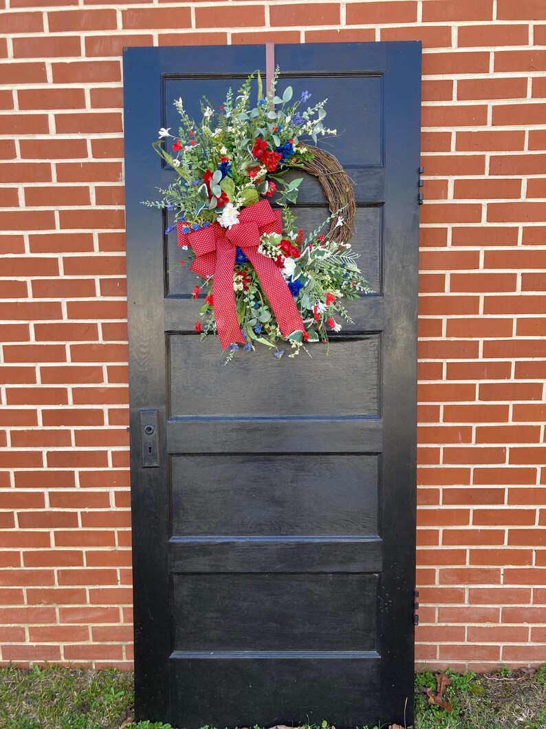 large red, white, and blue patriotic floral grapevine wreath