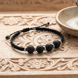 Bracelet en pierre de lave noire, macramé Shamballa, bijou diffuseur d'aromathérapie, amulette protection unisexe, cadeau pour se recentrer