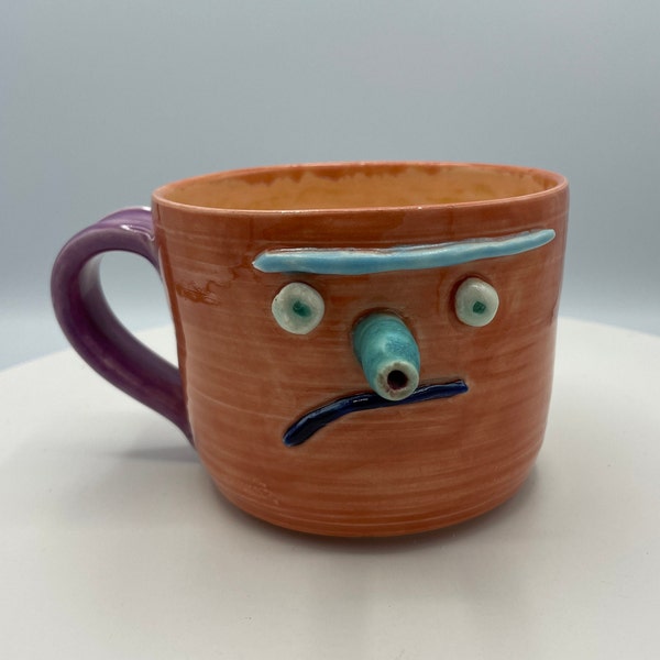 Hand made ceramic face mug