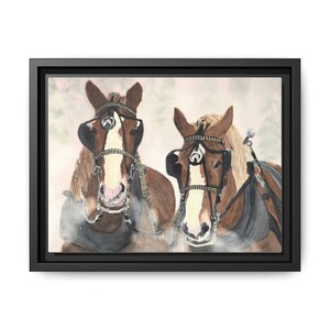 May include: A watercolor painting of two brown horses with black harnesses, their heads turned towards the viewer. The horses are in a snowy setting, with a light pink background.