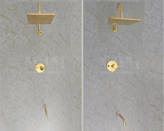 May include: A gold-toned shower head with a square rain shower head and a handheld shower head. The shower head is mounted on a wall.