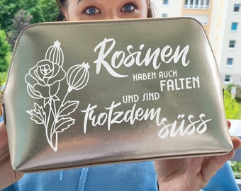 Cosmetic bag personalized with saying, name, "Raisins also have wrinkles and are still cute"