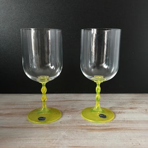Set of vintage Bohemian crystal wine glasses with yellow base
