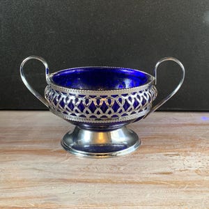 Vintage sugar bowl blue glass metalware England