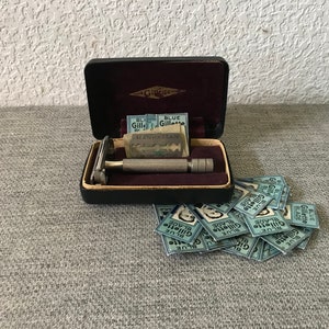 Original and vintage razor from Gillette in the original box with blue blades blades.