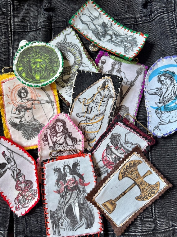 Deity battle jacket pins and badges