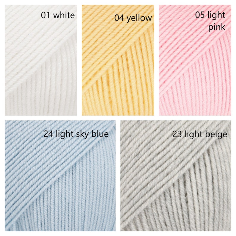 May include: A collection of yarn skeins in various colors, including white, yellow, light pink, light sky blue, and light beige. The yarn is arranged in a grid pattern, with each skein labeled with a number and color name.