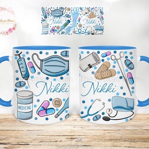 May include: Two white ceramic mugs with blue rims and handles. Both mugs feature a white background with blue polka dots and a variety of medical-themed illustrations, including a syringe, pills, a face mask, bandages, a stethoscope, and a roll of gauze. The name "Nikki" is written on both mugs.