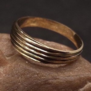 Original unusual trench ring from the trenches of the First World War in the style of trench art made from part of a bronze detail with cuts