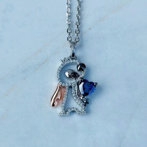Disney Treasures Lilo & Stitch Amethyst With 1/8 cttw CZ Round Cut Diamond Pendant Sterling Silver And Rose Gold Rhodium Plated Necklace 18&quot;