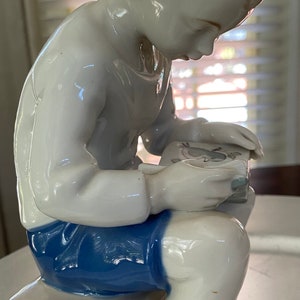 Vintage GDR 1877 porcelain boy reading book