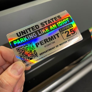 May include: A holographic parking permit with the text "UNITED STATES PARKING LIKE AN IDIOT PERMIT" in black and red. The permit expires in 2025 and includes a QR code and the Department of Motor Vehicles logo.