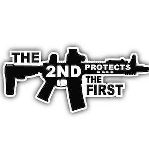 May include: Black and white silhouette of a rifle with the text "THE 2ND PROTECTS THE FIRST" superimposed on it.