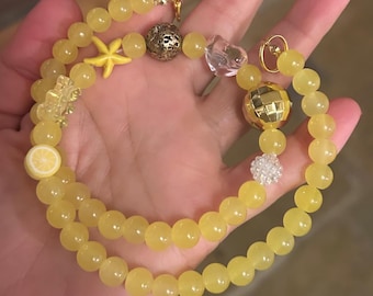 yellow necklace; yellow bead necklace; sunshine necklace; bead necklace; beaded necklace; statement necklace; charm necklace; happy necklace