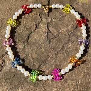 Pearl necklace; bow pearl necklace; rainbow necklace; rainbow bow necklace; colourful bead necklace; pink bow necklace; beaded necklace