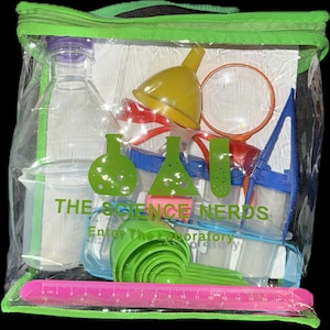 May include: A clear plastic bag filled with a variety of colorful science tools, including a funnel, magnifying glass, beakers, measuring cups, and a ruler. The bag has a green zipper and the text "The Science Nerds Enter The Laboratory" printed on the front.