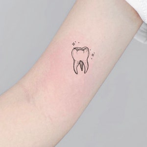 Wisdom tooth by Tim Pangburn TattooNOW