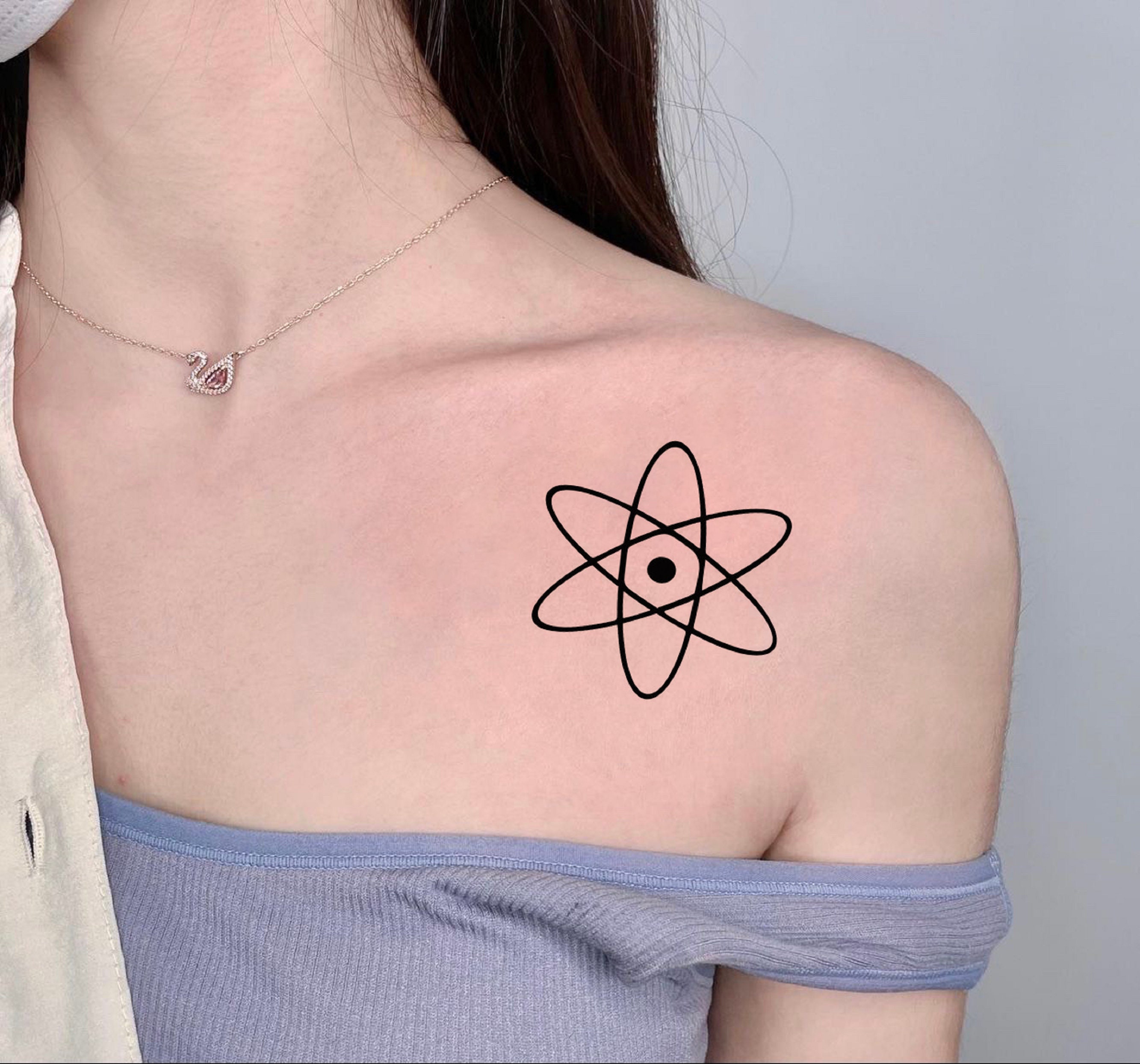 Joa Antoun Tattoos - “The theory of emptiness...” #arrow #minimalist  #arrowtattoo #inked #atomtattoo #ink #universe #tattooartist #blackwork  #tattooed #atom #linework #tattoodesign #tattoo #linetattoo #tattoos  #blacktattoo #tattooart | Facebook