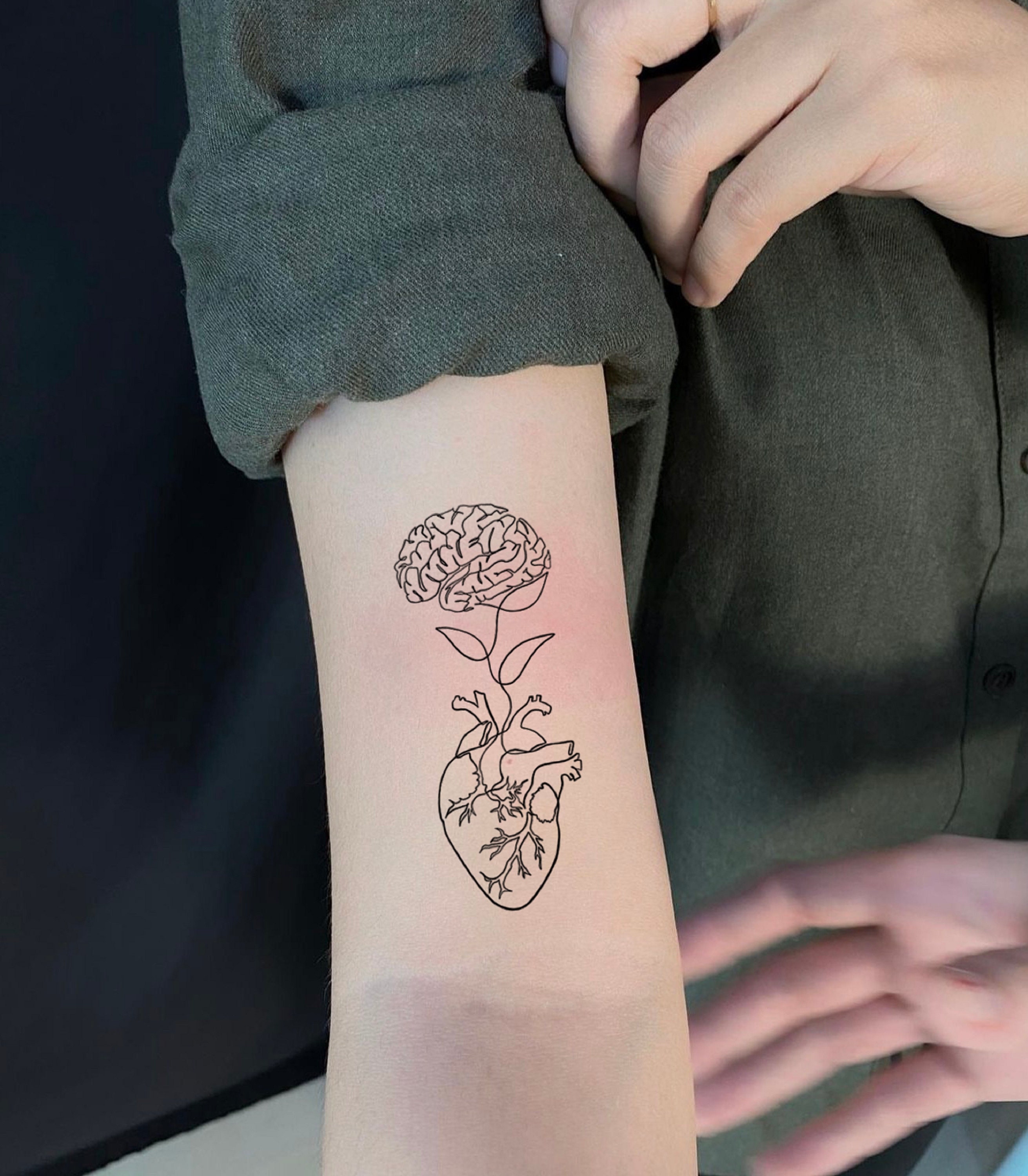 My Skull and brain flower tattoo done by Daniel Connolly in Inksane,  Athlone : r/tattoos