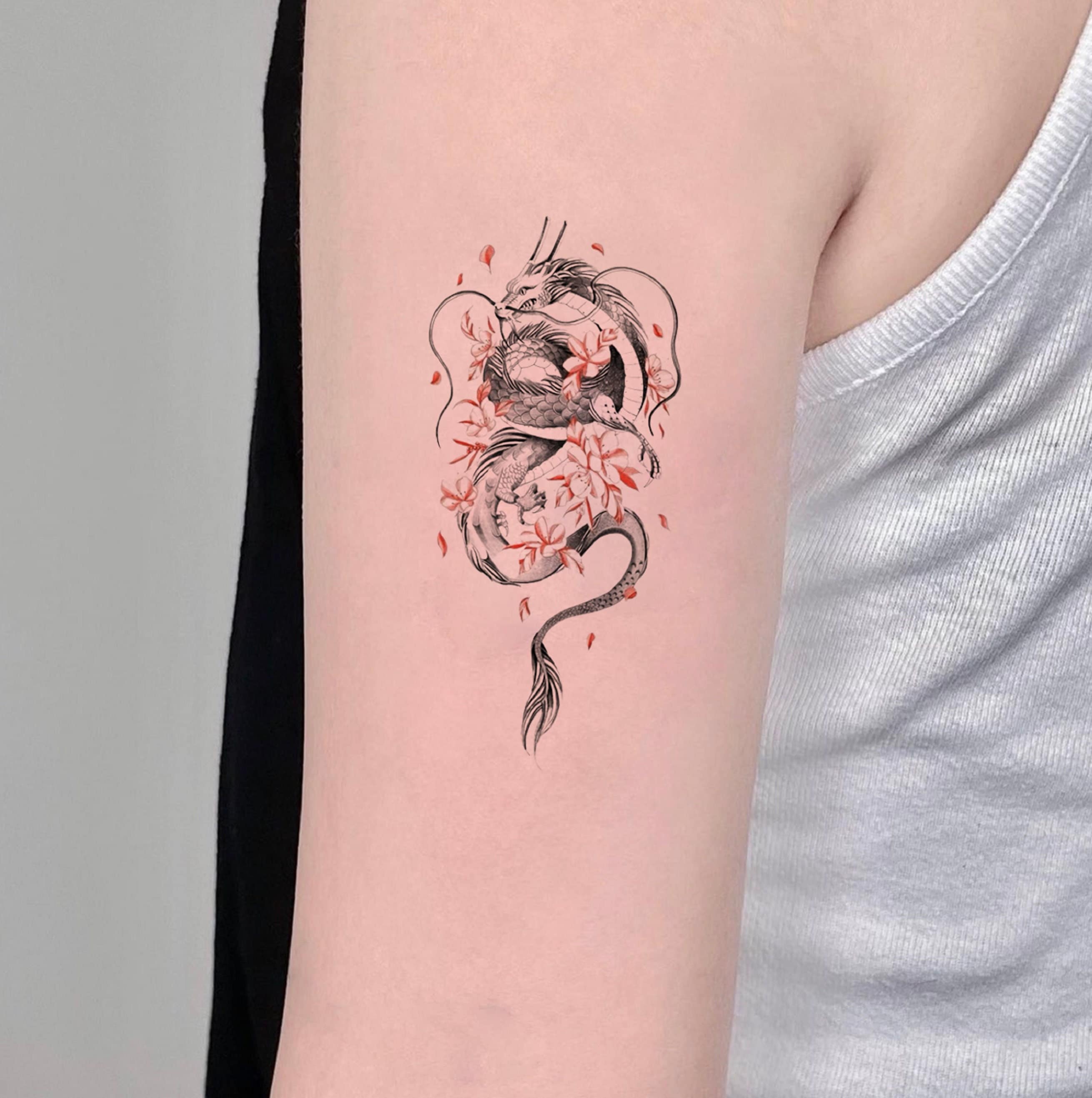 Por Vida Tattoo - Dragon and flower back tattoo done by Alex  @alexbocatattoo #dragontattoo #flowertattoo #tattoostyle #blacktattoo  #edgeley | Facebook