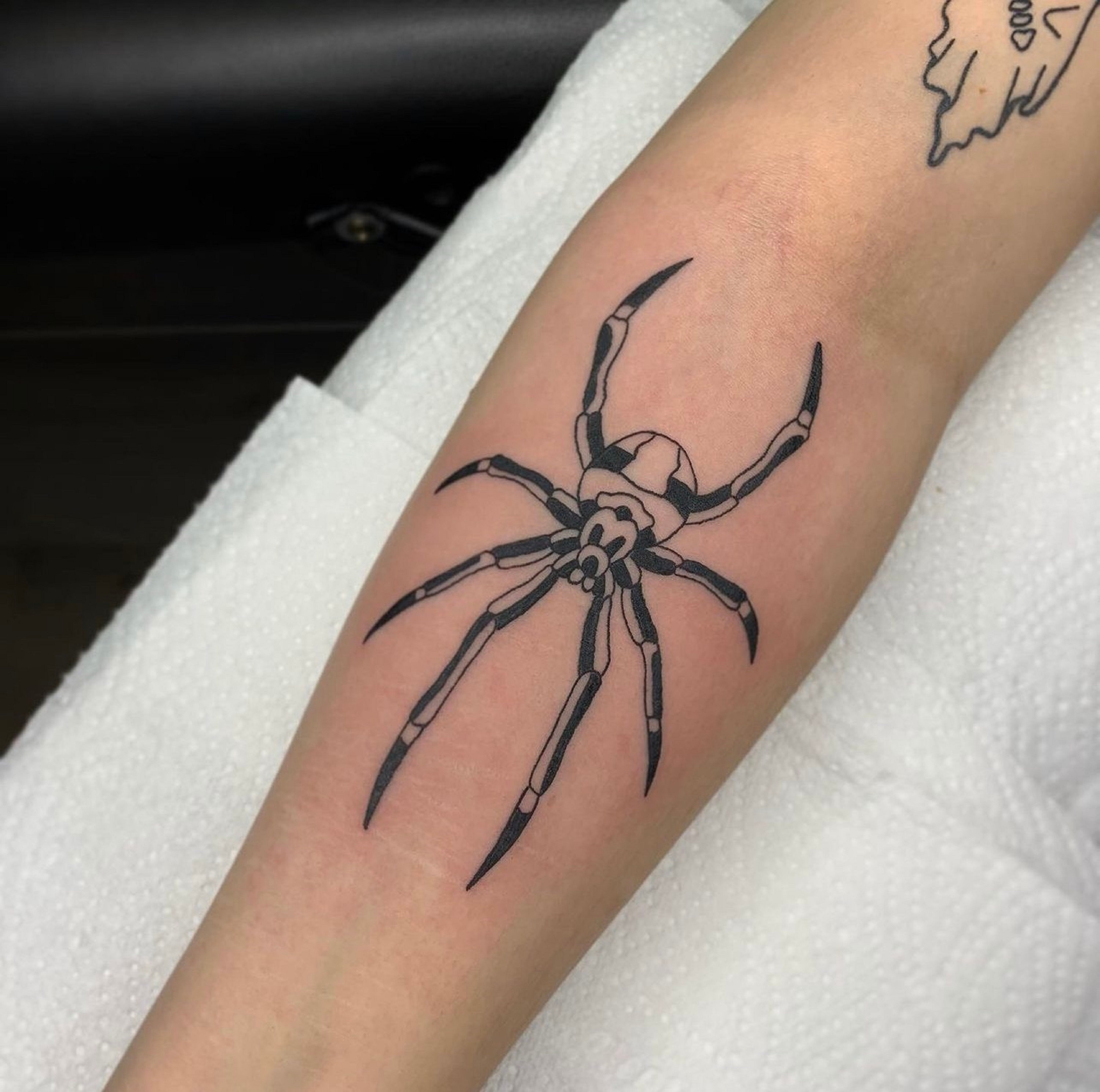 Man with Spider Tattoo on Head