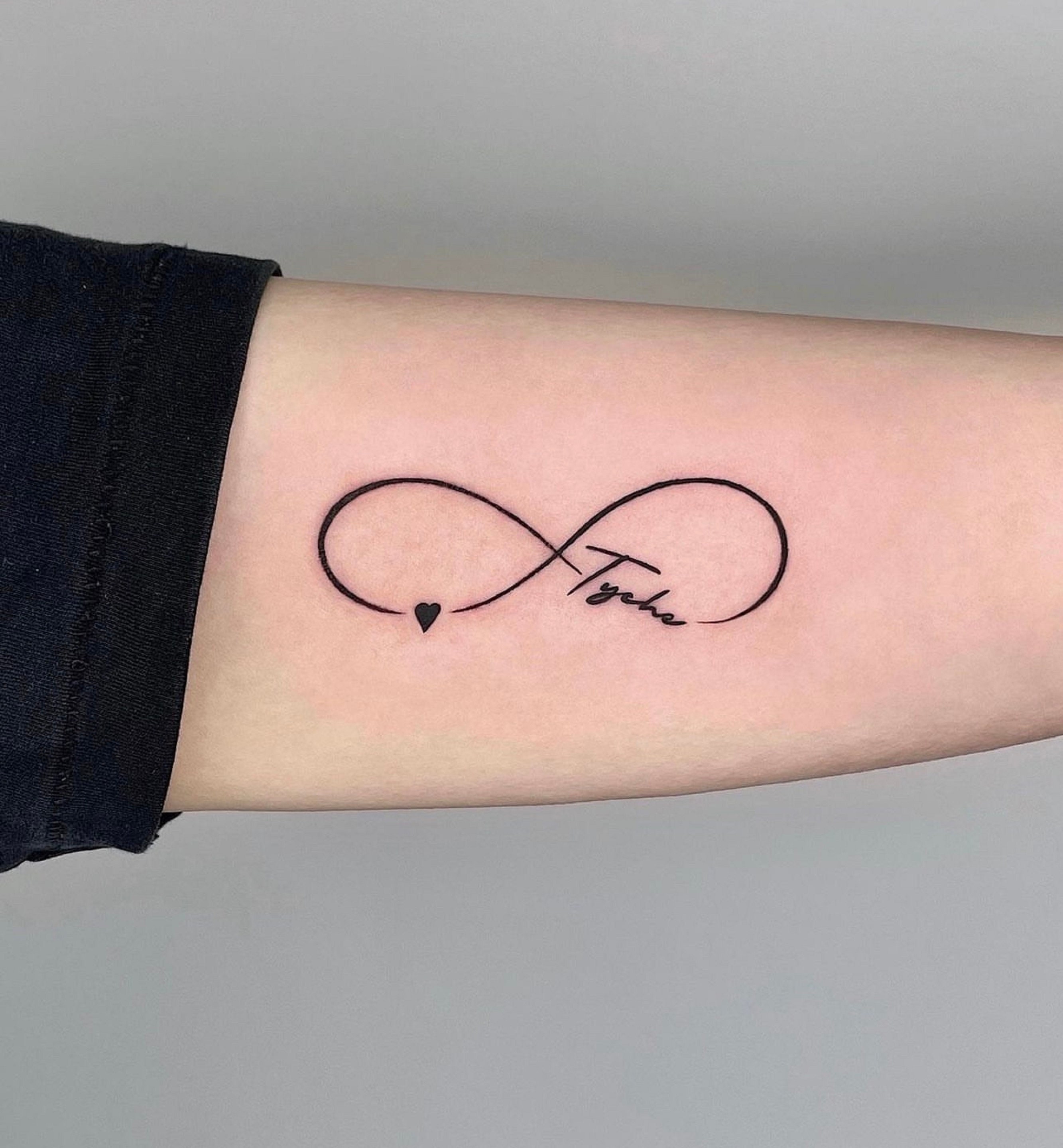 Small infinity symbol tattoo @spitfireInk #wristpain #wristtattoos #ta... |  TikTok