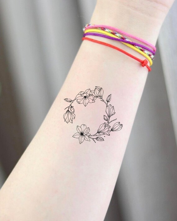 Tattoo uploaded by Xavier • Floral bracelet tattoo by Tattooist Flower.  #TattooistFlower #SouthKorean #flower #floral #bracelet #band #lovely  #subtle #fineline • Tattoodo