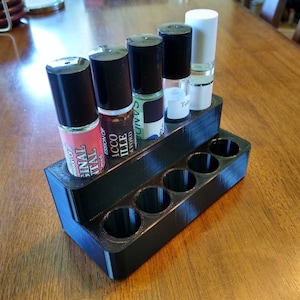 Cologne / Perfume bottle holder that holds 10 ml perfume parlour and quality fragrance oil bottles