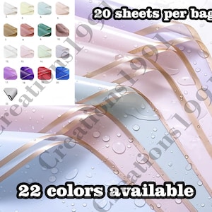 May include: A close-up of tissue paper in various colors, with a gold ribbon. The text "20 sheets per bag" and "22 colors available" is visible.
