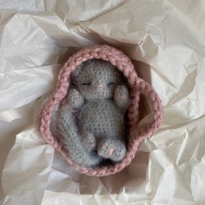 Newborn Kitten Sleeping Fluffy Gray Toy. Realistic Cat in the pink basket|crib. Crochet Handmade Gift for Toddlers.