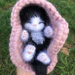 Sleeping Kitten Fluffy Black White toy with collar. Realistic Newborn Cat in the pink basket|crib. Crochet Handmade Gift for Toddlers.