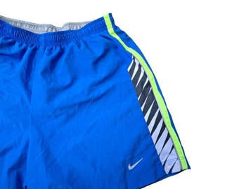Męskie spodenki do biegania Nike Dri-FIT, niebieskie, odblaskowe, 5 cali, do ćwiczeń na siłowni