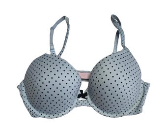 Sujetador Victoria’s Secret Body 34C Perfect Shape azul con lunares negros, relleno, con aros y efecto push-up.