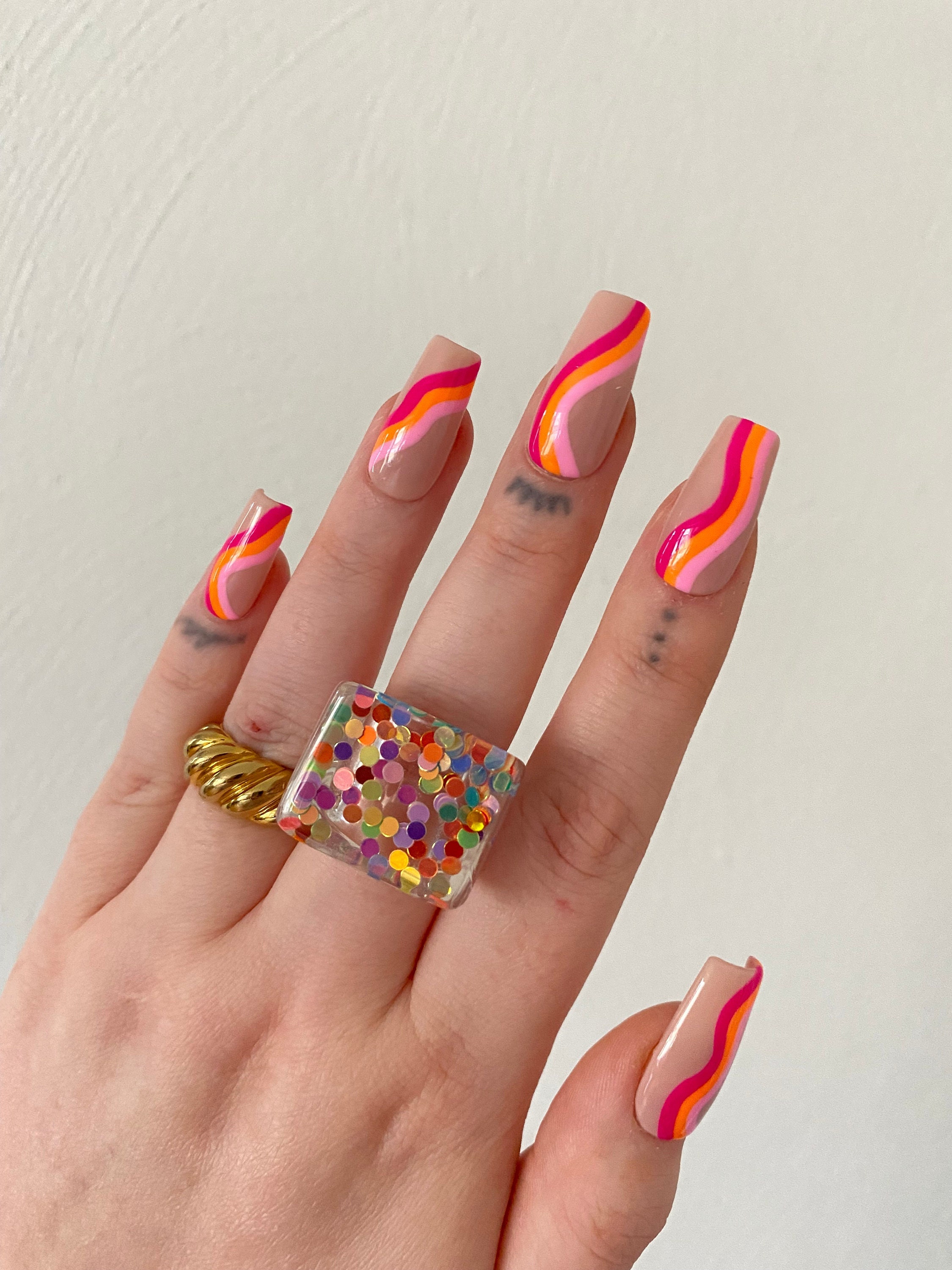 Abstract Orange Swirl Nails