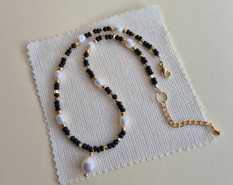 Black and gold seed bead necklace: freshwater pearls, 4mm glass beads and crystals with pearl pendant