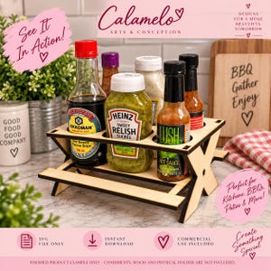 May include: A wooden condiment holder shaped like a miniature picnic table with four circular cutouts for bottles. The light-colored wood features dark edges and a cross-legged base design. It is shown holding various condiment bottles including soy sauce.