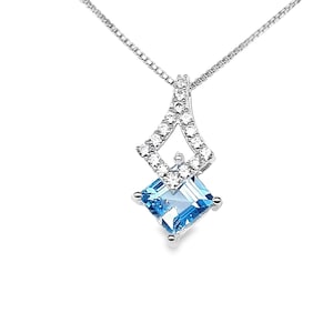 Blue Topaz And Cubic Zirconia Pendant